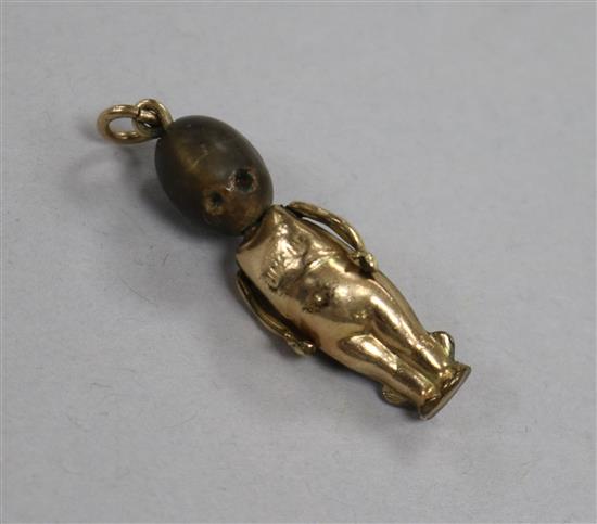 An early 20th century gold plated Fums Up charm, 32mm.